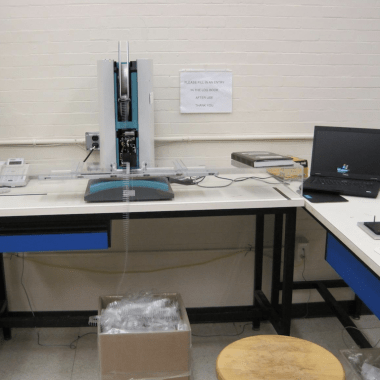 Desks with pipetting system and computer workstation