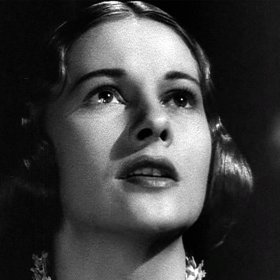 Black-and-white movie still of an actress' face