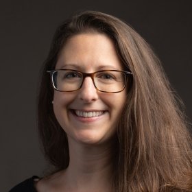 Smiling woman with glasses