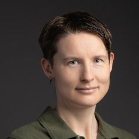 Person with short dark hair