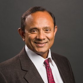 Person wearing jacket and tie