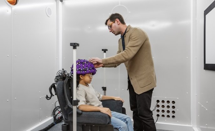 Scientist and participant in the OPM room. Photo by Anton Grassl, courtesy of SmithGroup